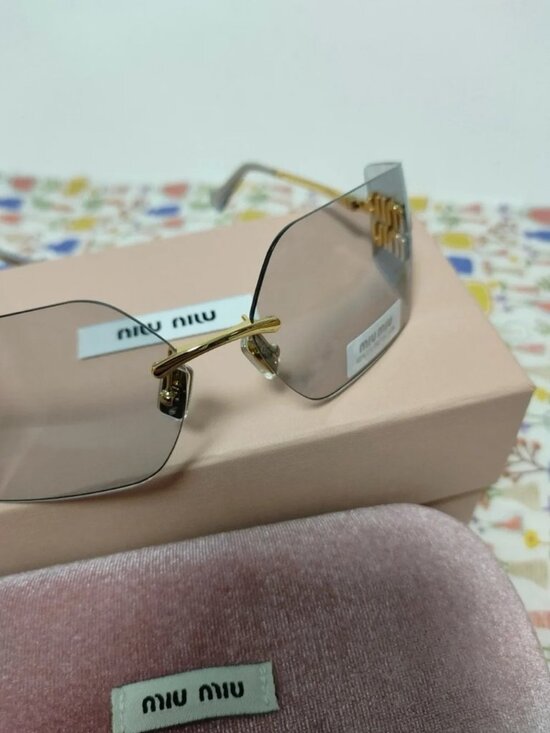✨ Miu Miu Rimless Grey Sunglasses with Gold Logo Detail main image 6
